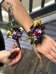 Custom graduation flowers including bouquets, corsages, flower crowns, and boutonnieres handcrafted by The Lavender House.